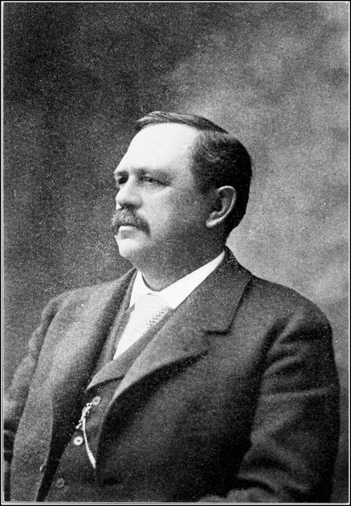 Black-and-white photographic portrait of Wilbur Olin Atwater, a man with a mustache in a dark suit